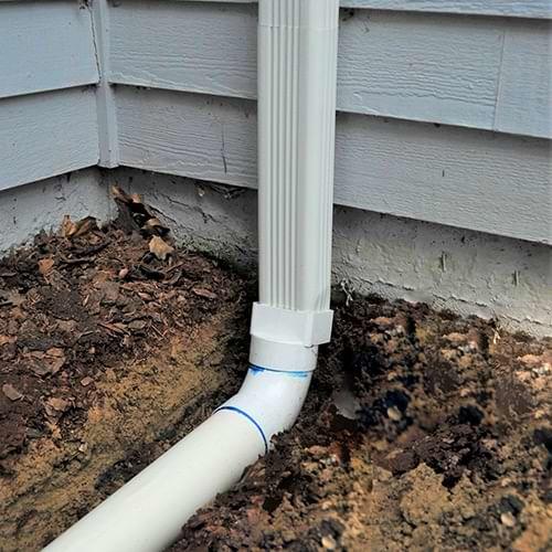 A NO Dealers installs gutter downspout extensions in [major cities 2]