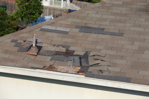 Hurricane roof damage in [city 1]